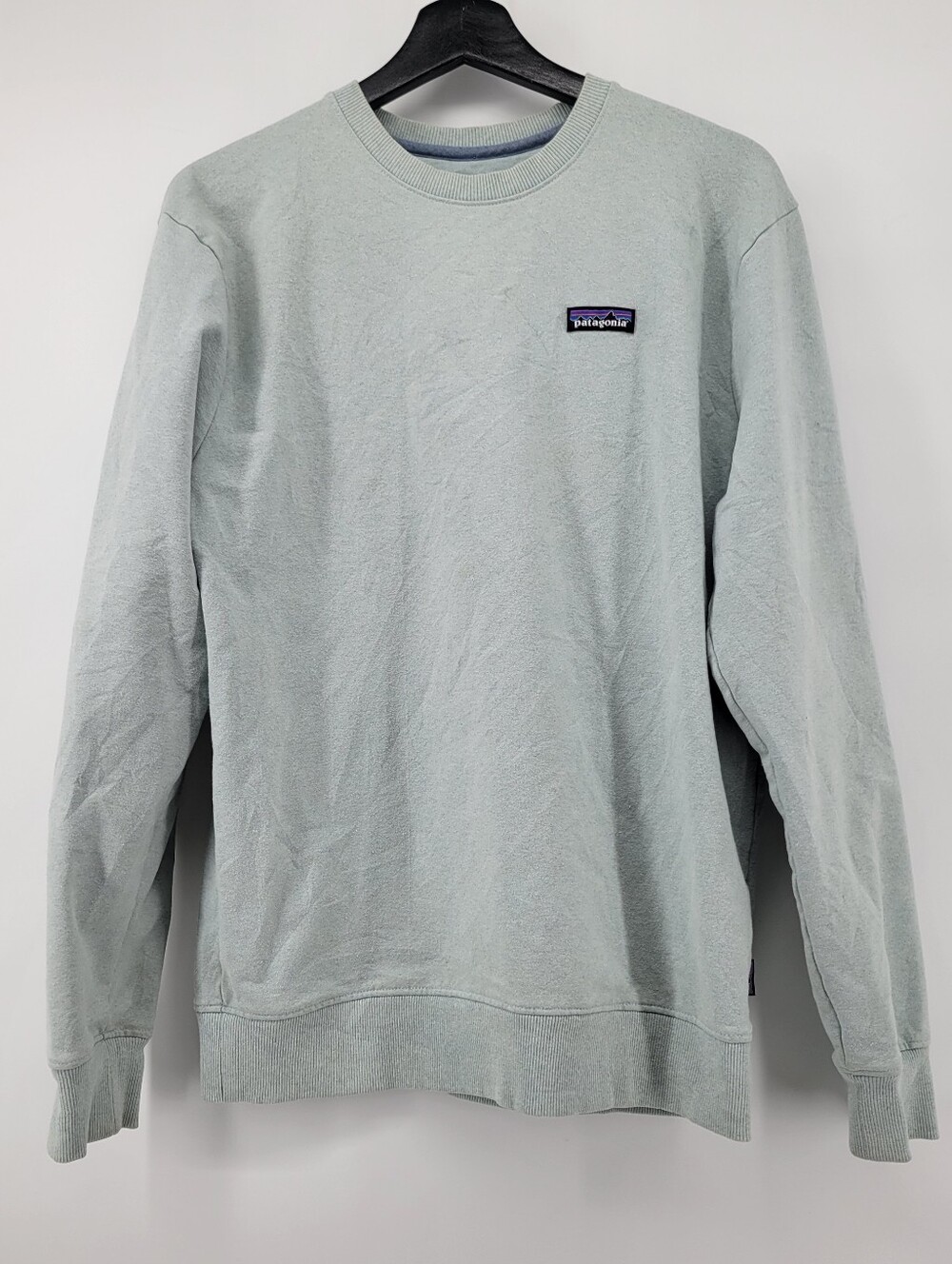 Patagonia P-6 Label Uprisal Crew Sweatshirt in a light green or light grey color